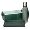 a green machine with a metal lid