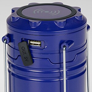 Additional Image 4 - a blue cylinder with a black handle