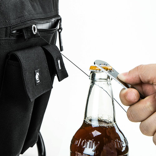 Additional Image 1 - a person opening a bottle of liquid