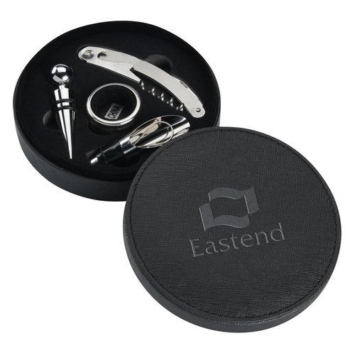 Additional Image 1 - a black circular object with a screwdriver and a knife