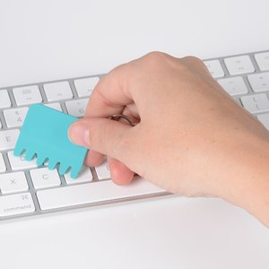 Additional Image 2 - a hand holding a piece of paper