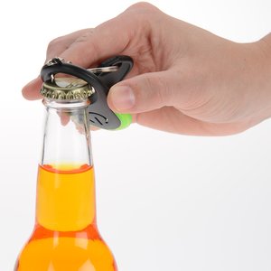 Additional Image 3 - a hand opening a bottle of orange liquid
