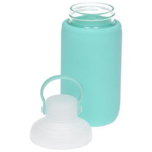 Additional Image 2 - a blue bottle with a white cap