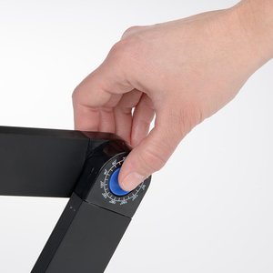 Additional Image 5 - a hand holding a black tape