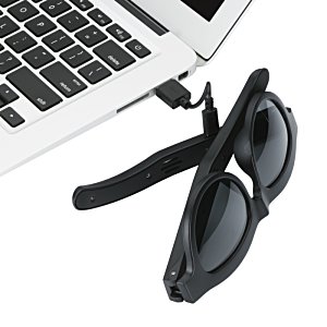 Additional Image 5 - a pair of sunglasses on a laptop