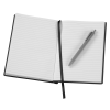 a pencil on a book