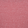 a pink surface with white specks