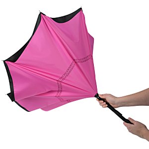 Additional Image 5 - a person holding a pink umbrella