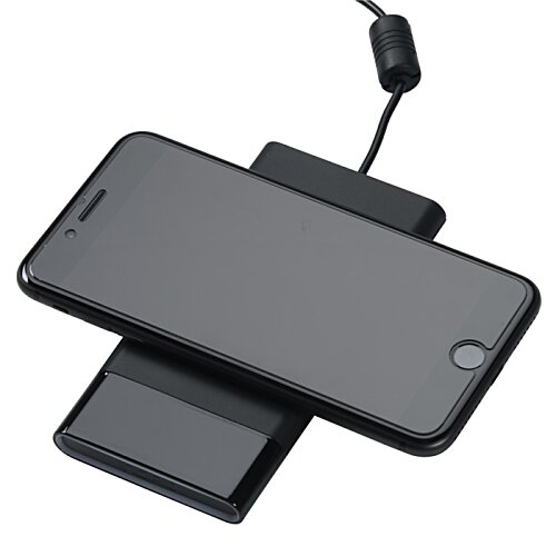 Additional Image 4 - a black cell phone on a wireless charger