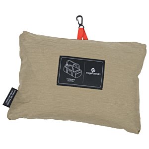 Additional Image 2 - a brown pillow with a black label