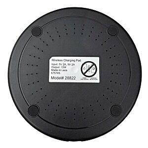 Additional Image 5 - a black circular object with a white label