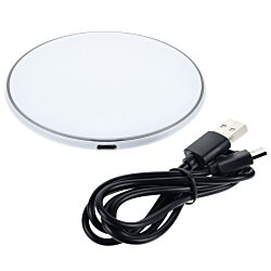 a white circular object with a black cord
