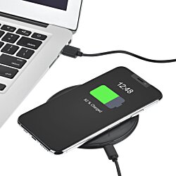 a black device with a green screen on it