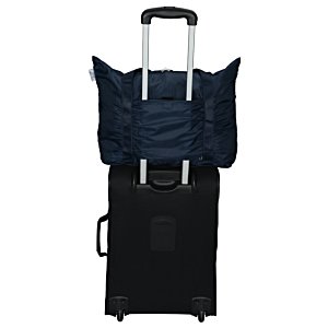 Additional Image 2 - a black luggage with a black pillow on top