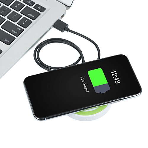 Additional Image 4 - a cell phone charging on a wireless charger