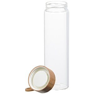 Additional Image 1 - a coconut next to a glass container