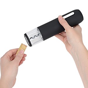 Additional Image 3 - a person holding a black and silver canister