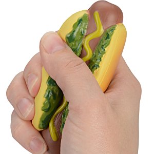 Additional Image 1 - a hand holding a hot dog