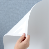 Additional Image 1 - a hand holding a white sheet of paper