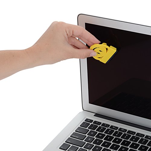 Additional Image 3 - a hand holding a yellow object in front of a laptop
