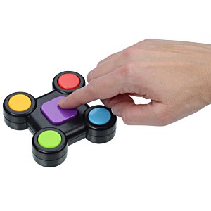 Additional Image 1 - a hand holding a finger on a fidget spinner