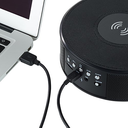 Additional Image 4 - a black round device with buttons and a laptop