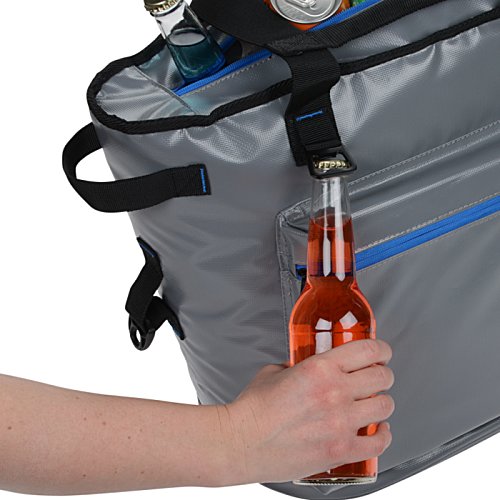 Additional Image 2 - a person holding a bottle of liquid