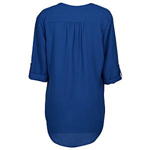 Additional Image 1 - a blue shirt on a white background