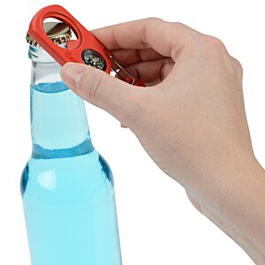 Additional Image 1 - a hand holding a bottle of blue liquid