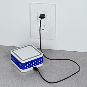 Additional Image 3 - a blue and white box with a black cord plugged into a wall outlet