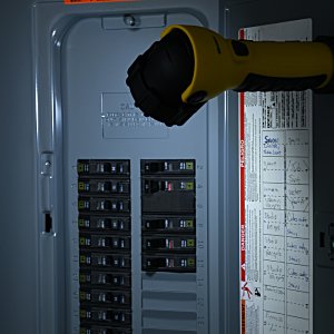 Additional Image 3 - a yellow flashlight on a grey panel