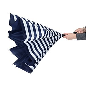 Additional Image 1 - a hand holding a blue and white striped umbrella