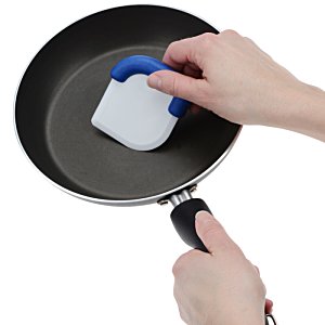 Additional Image 2 - a hand holding a pan with a brush