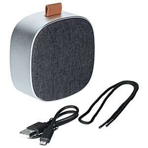Additional Image 1 - a round speaker with a cord