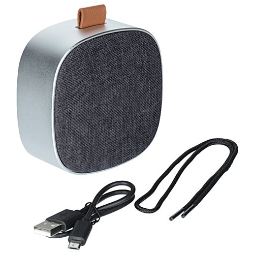 Additional Image 1 - a round speaker with a cord