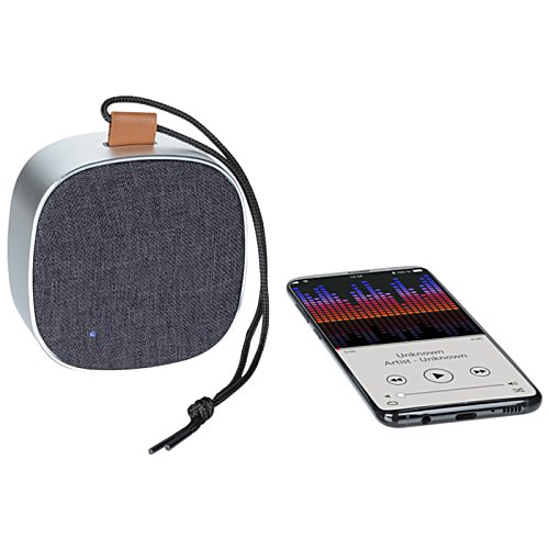 Additional Image 4 - a round speaker next to a remote control