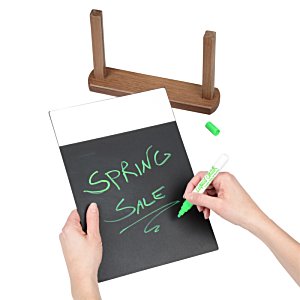 Additional Image 1 - a person writing on a black board