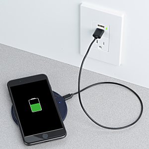 Additional Image 1 - a phone charging on a charger