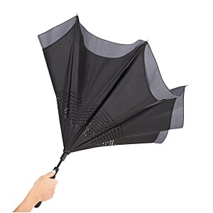 Additional Image 5 - a black umbrella held by a hand