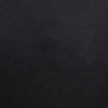 a black surface with white spots