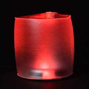 Additional Image 6 - a red candle on a black background
