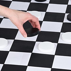 Additional Image 3 - a hand holding a black and white checkerboard