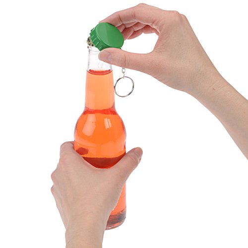 Additional Image 3 - a hand holding a bottle of liquid