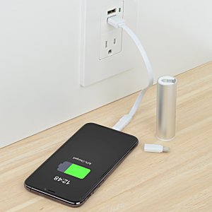 Additional Image 1 - a phone charging on a table