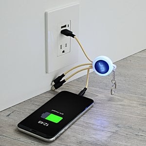 Additional Image 3 - a phone charging in a wall outlet