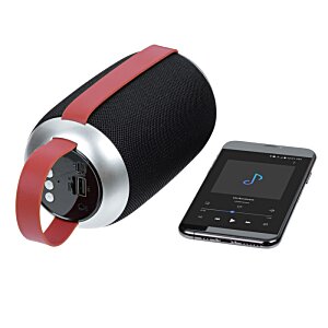 Additional Image 3 - a black and red speaker next to a cell phone