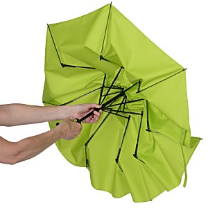 Additional Image 4 - a person holding a green umbrella