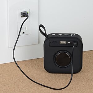 Additional Image 4 - a black square object with a cord plugged into a wall