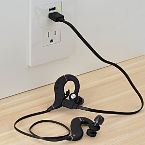 Additional Image 4 - a black earbuds plugged into a wall outlet