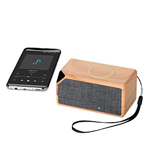 Additional Image 2 - a cell phone next to a speaker